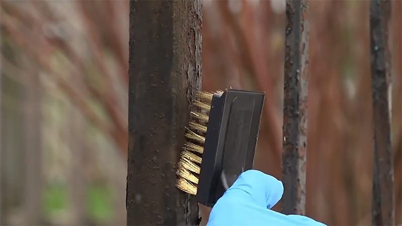 Use steel wool or a wire brush to remove rust